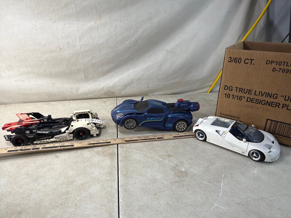 Scale Model Car, Brick-Built Race Car, and Toy Vehicle
