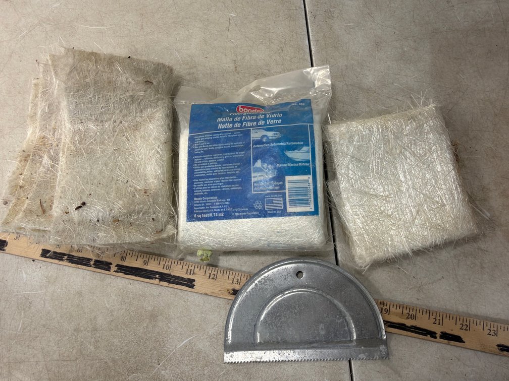 Fiberglass Matting and Metal Notched Spreader Tool