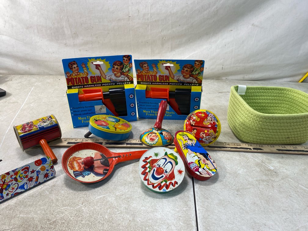Tin Lithograph Noisemakers, Toy Potato Guns, and Basket