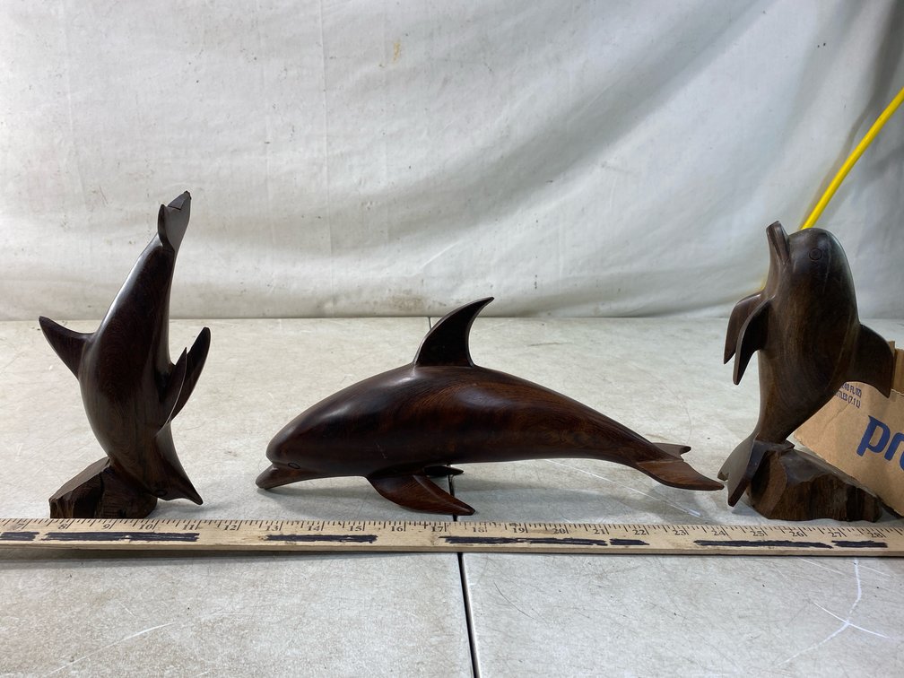 Carved Dark Wood Dolphin Figurines