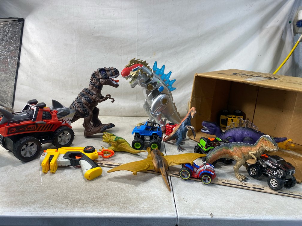 Toy Dinosaur Figures, Monster Trucks, Nerf Blaster, and More