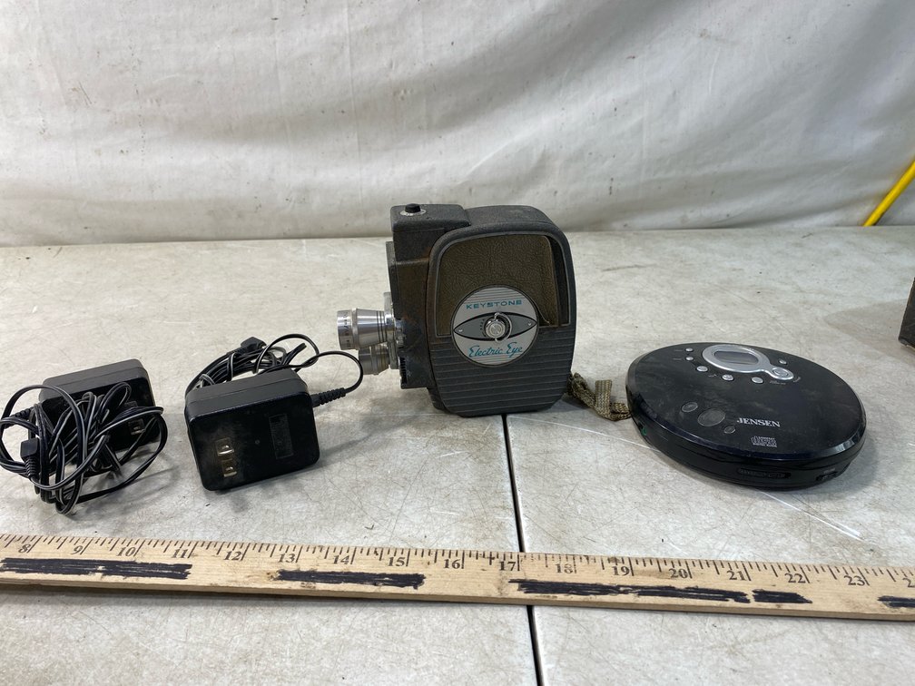 8mm Movie Camera, Portable CD Player, and AC Power Adapters