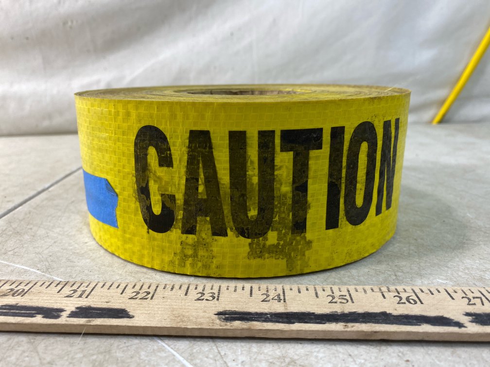 Yellow Caution Tape and Yellow Strapping Rolls