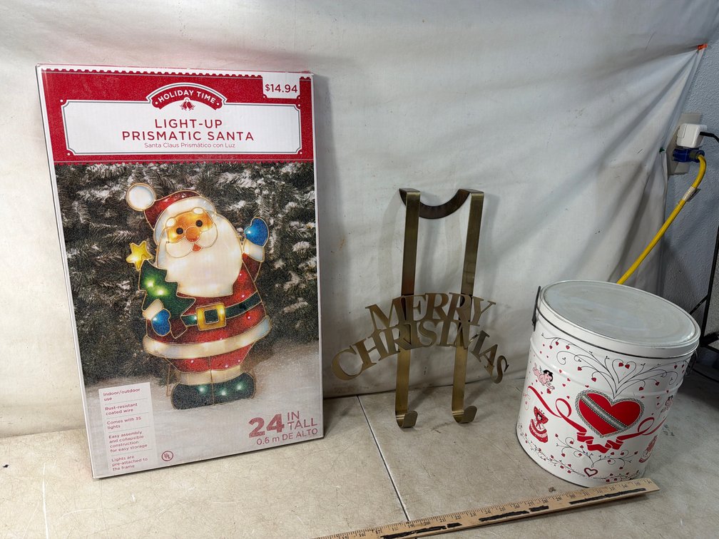 Light-Up Prismatic Santa, Door Hanger, and Decorative Tin