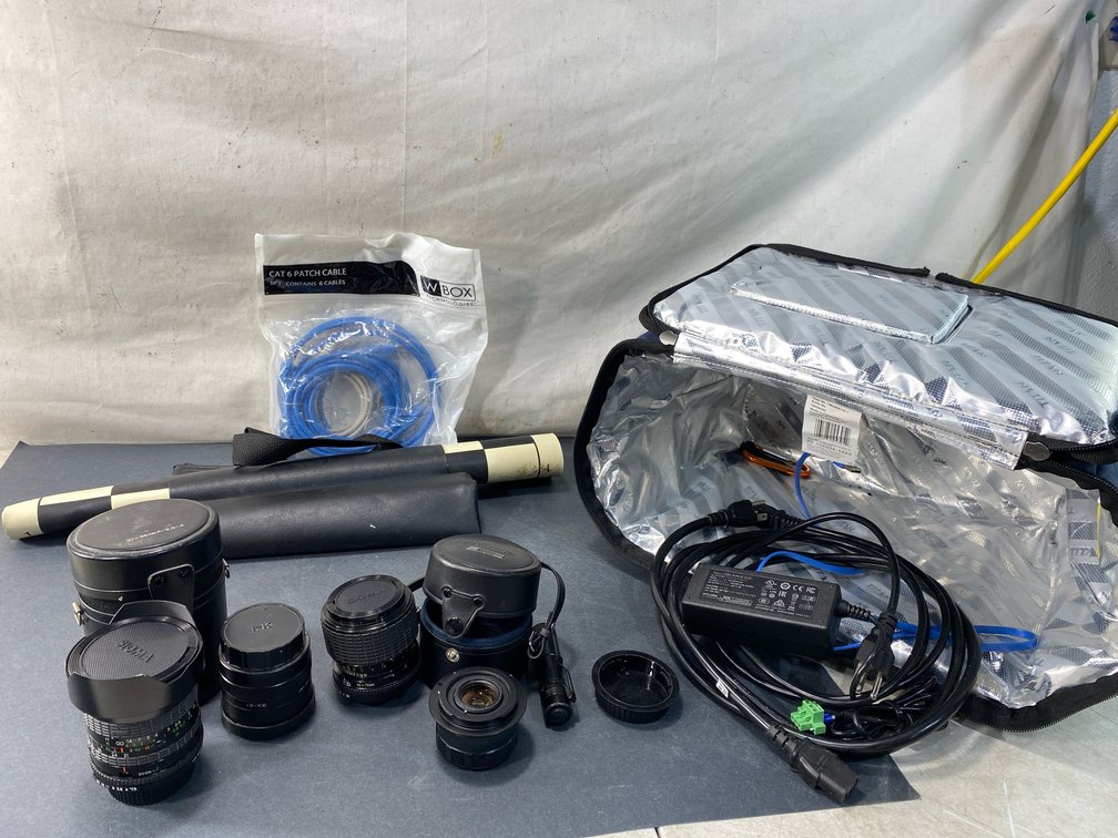 Camera Lens, Cable, Power Adapter, and Cooler Bag