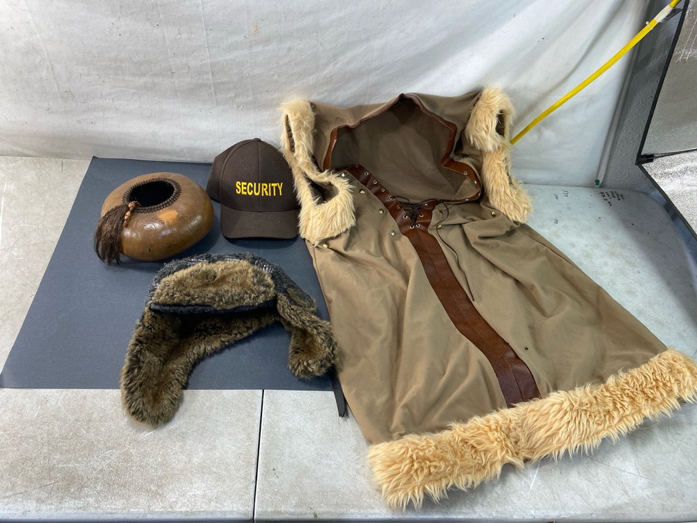 Hooded Vest, Trapper Hat, Baseball Cap, and Etched Gourd Pot