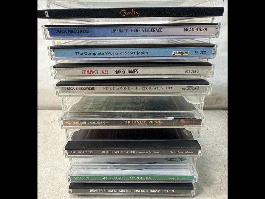 Music CD and DVD Media with Clear Acrylic Rack