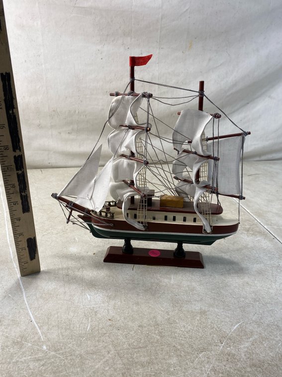 Two-Masted Model Sailing Ship on Wood Stand