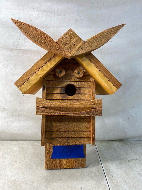 Rustic Wooden Birdhouse with Face Motif