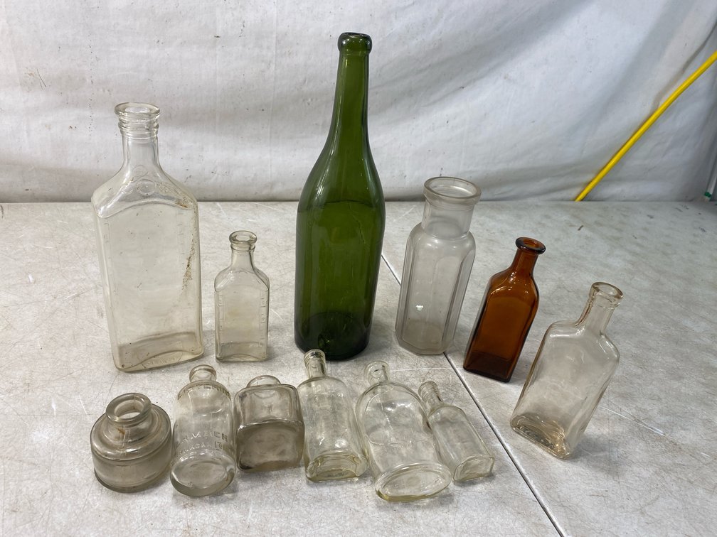 Glass Bottles and Inkwell