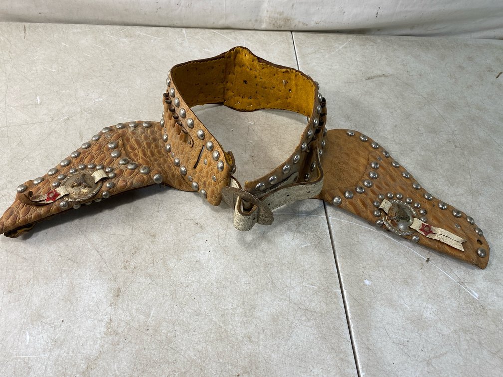 1950s Gene Autry and Champion double toy cap gun holster set made by the Leslie-Henry company.