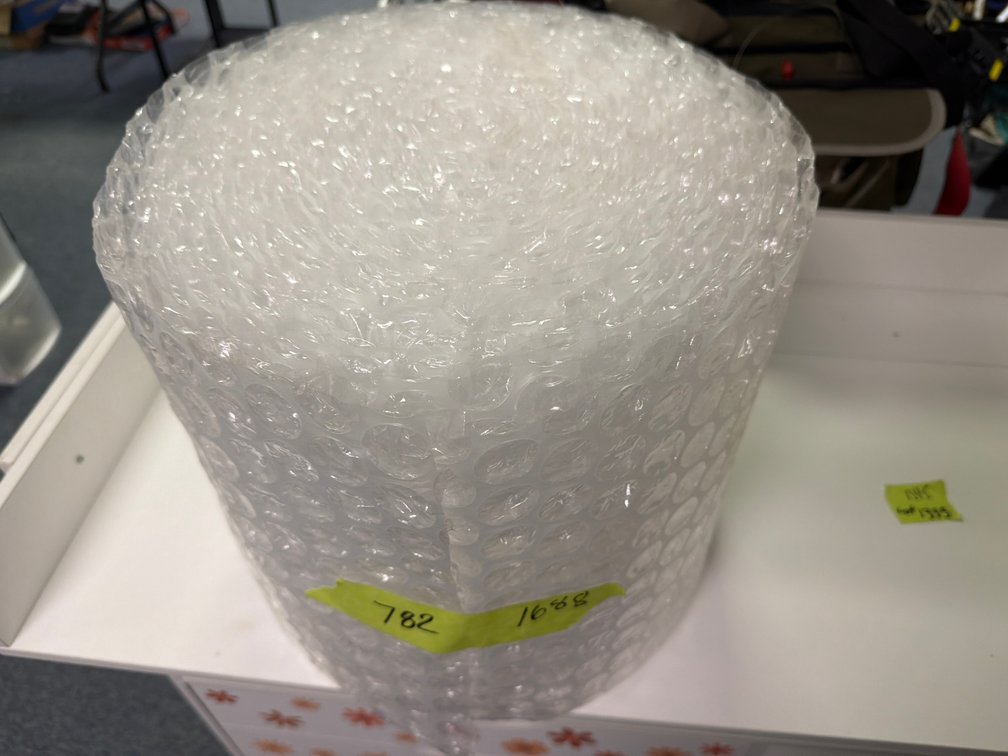 Bubble-Wrapped Cylindrical Item