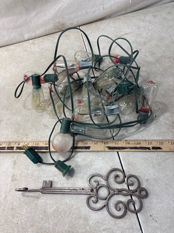 String Light and Decorative Cast Metal Key