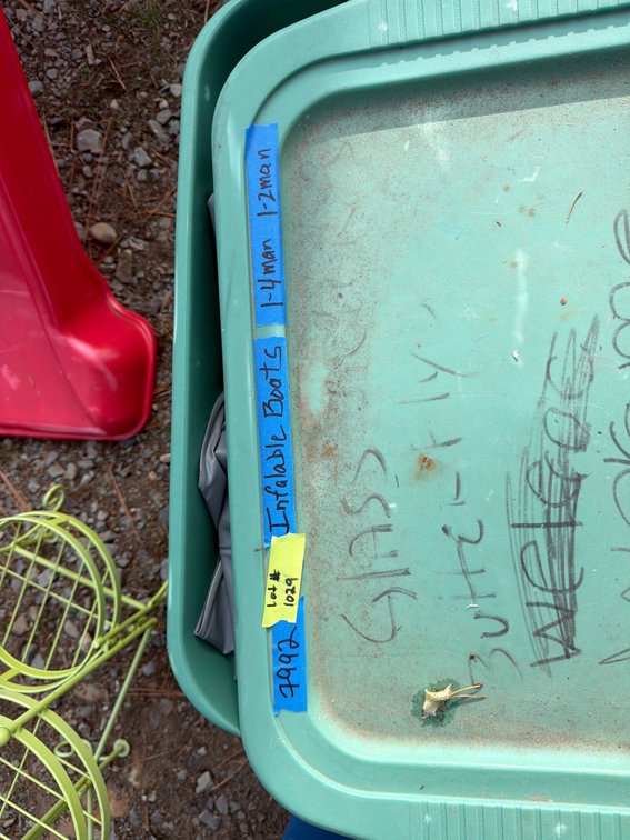 Inflatable Boat in Plastic Storage Tote
