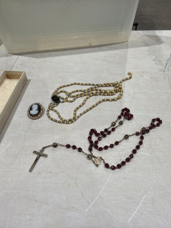 Rosary, Faux Pearl Necklace, and Cameo Brooch