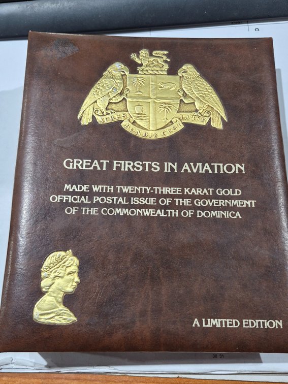 6 23K gold Stamps in collectors Book