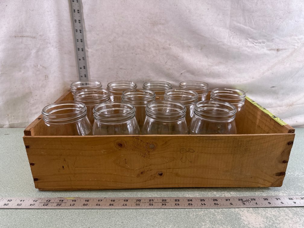 Glass Jars in Wooden Crate