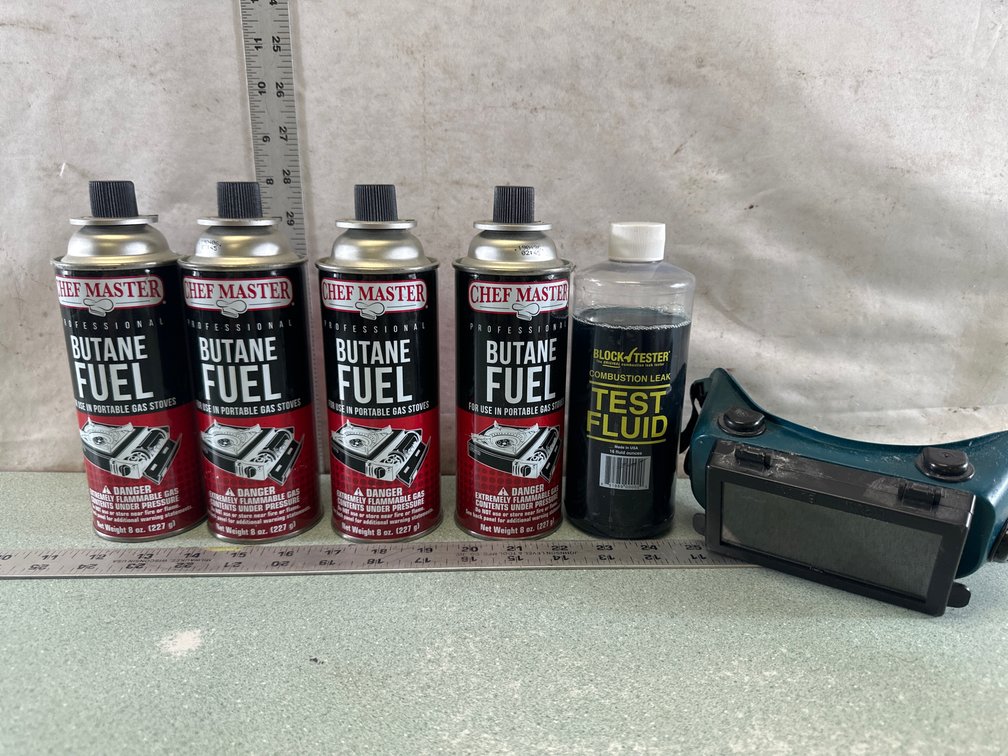 Butane Fuel, Combustion Leak Test Fluid, and Welding Goggles