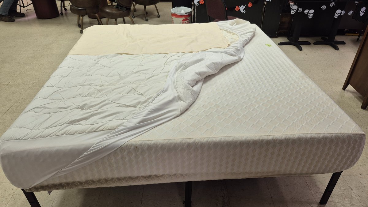 Mattress on Black Metal Platform Bed Frame