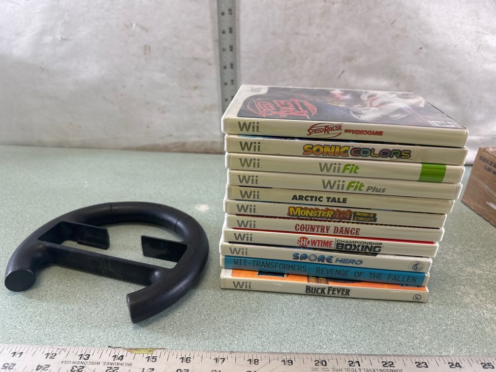 Nintendo Wii Video Games and Steering Wheel Accessory