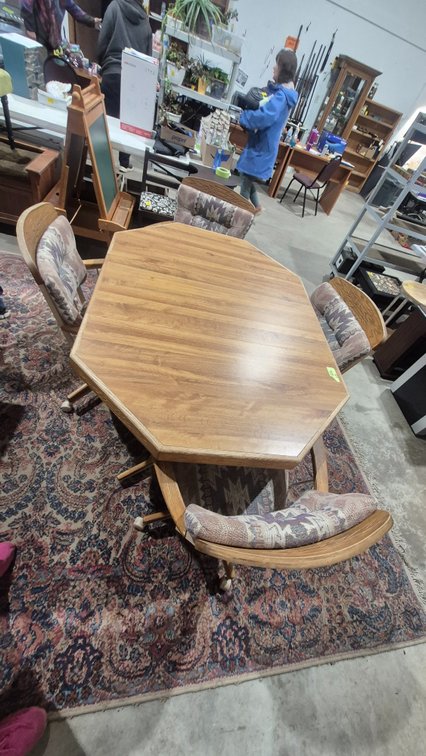 Oak Finish Octagonal Table and Caster Chairs