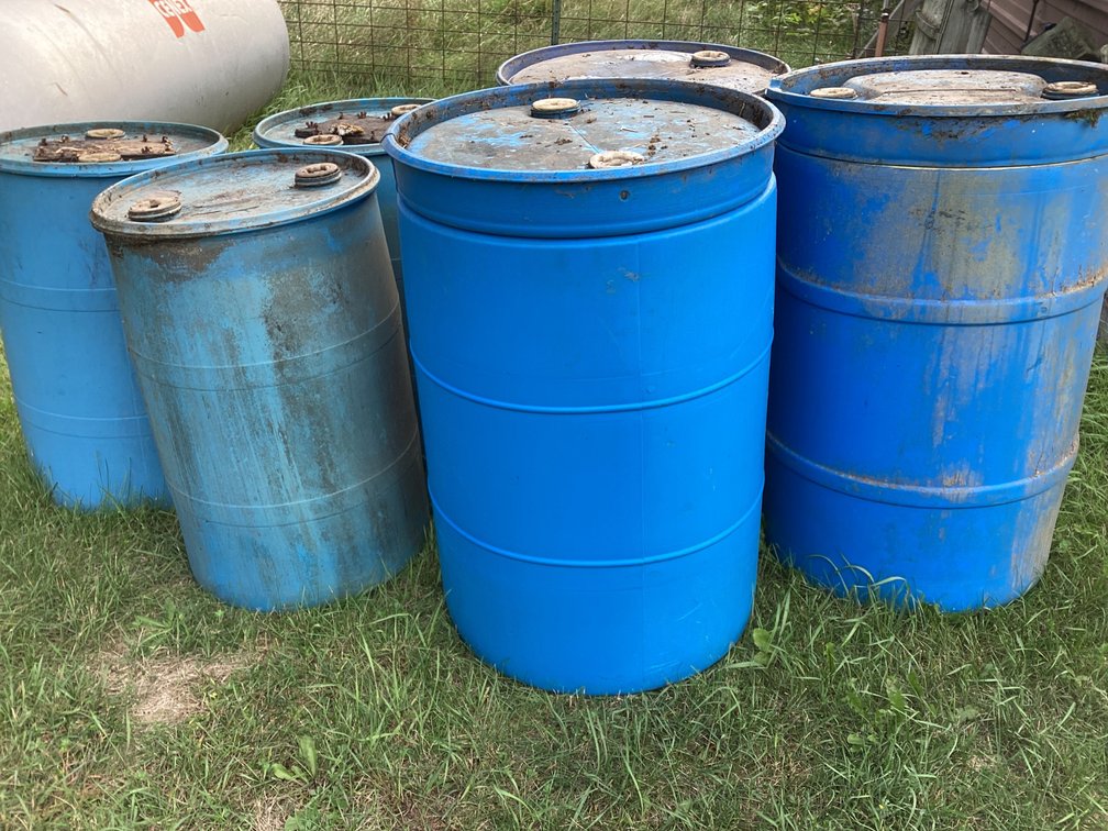 6 plastic blue barrels.  3 small and 3 large