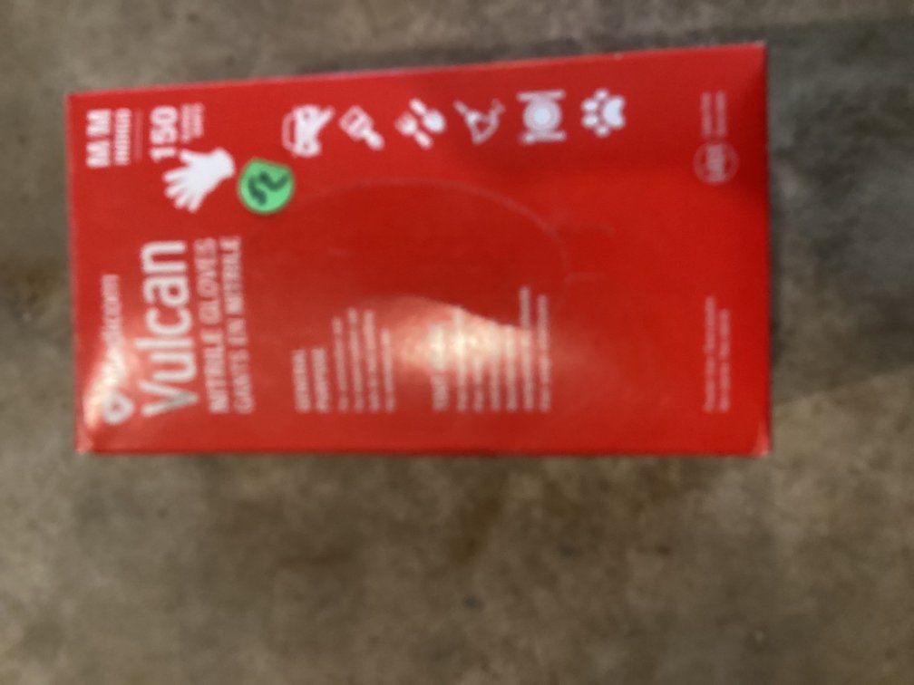 Looks to be almost full box of nitrile Vulcan medium gloves