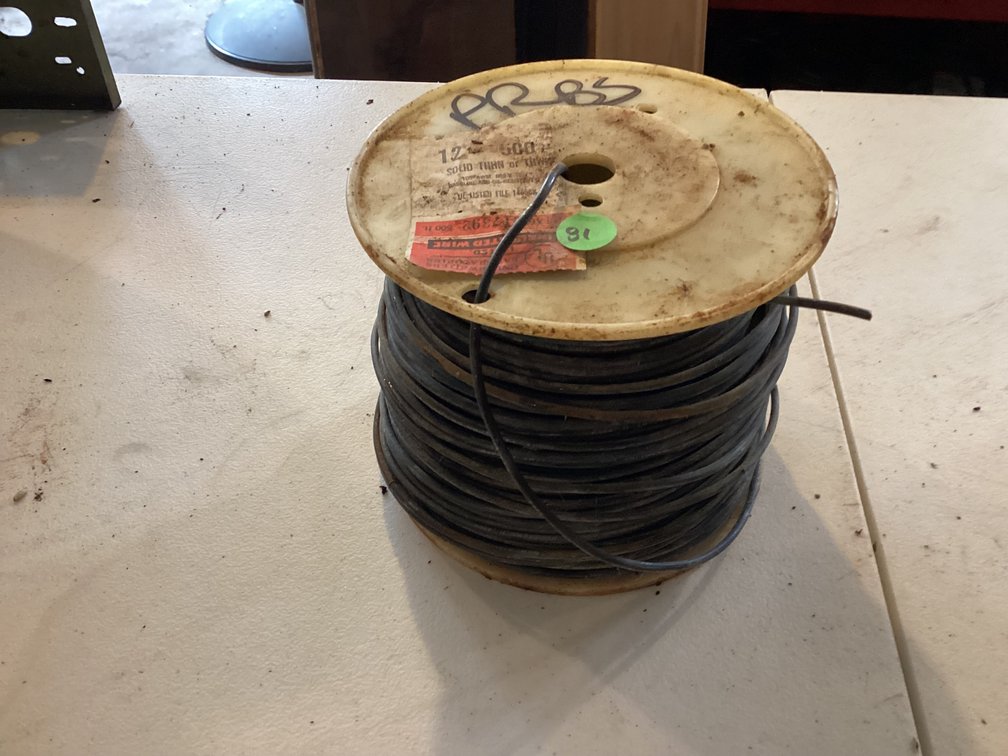 Large roll of solid thin insulated wire