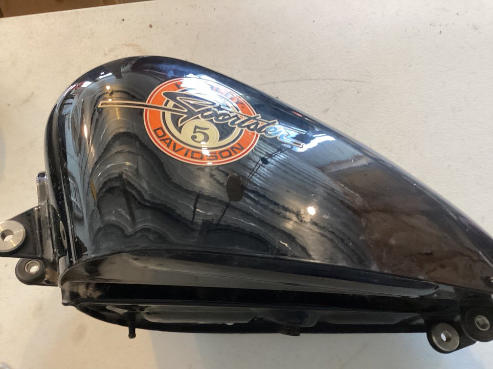 Harley Davidson Sportster Gas Tank. Slight damage as shown