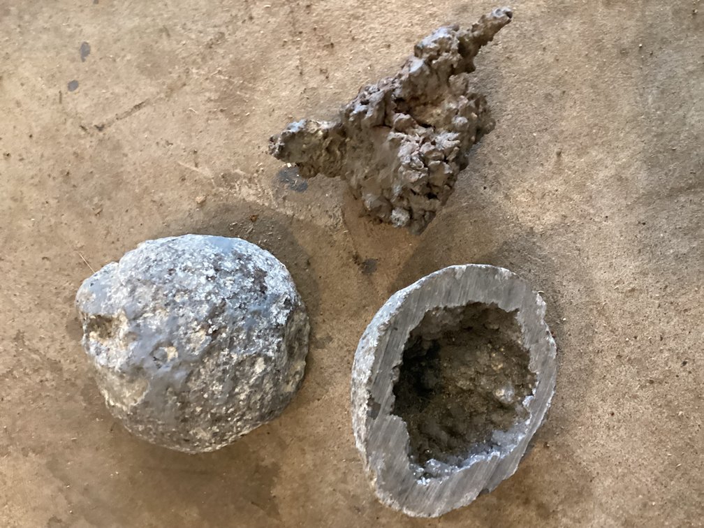 Chunk of Michigan copper 3 1/2”. And a cut rock