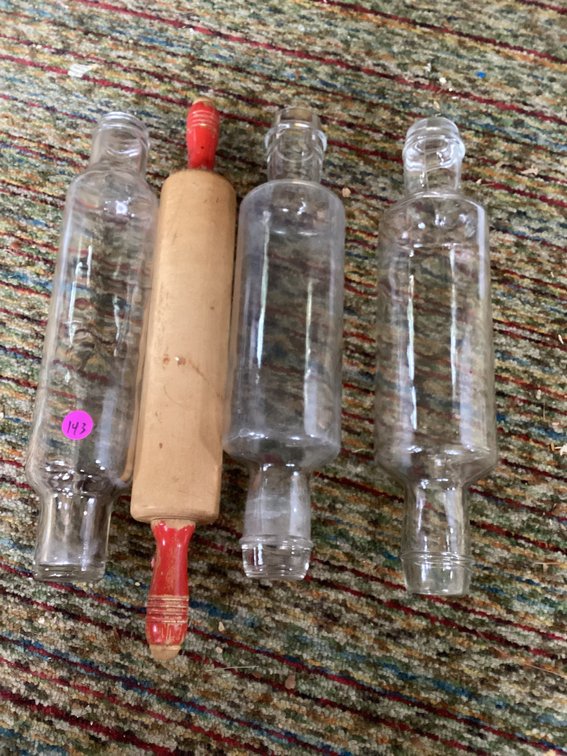 1 wood and 2 glass rolling pins.  Small one gone