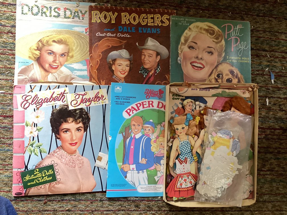 As shown antique cut out dolls. 50’s stars