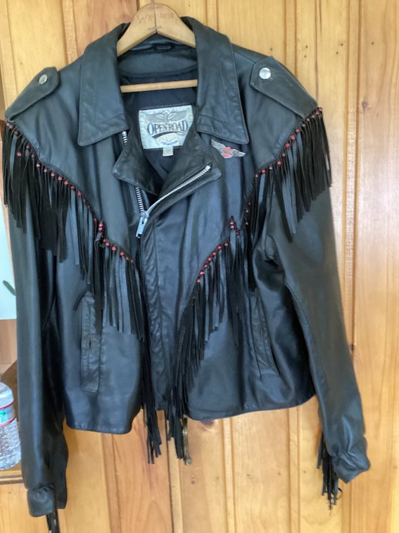 Mens XL Open Road fringed biker jacket. Has Harley patch on it