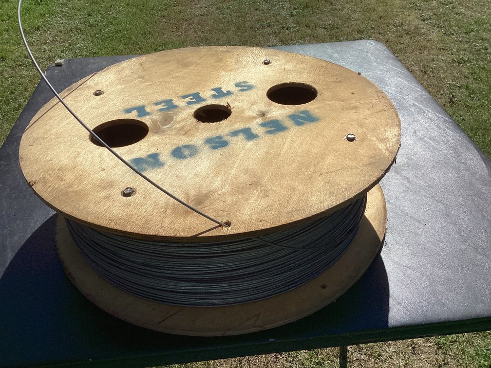 Nelson steel high tensile electric fence wire.  Almost full roll