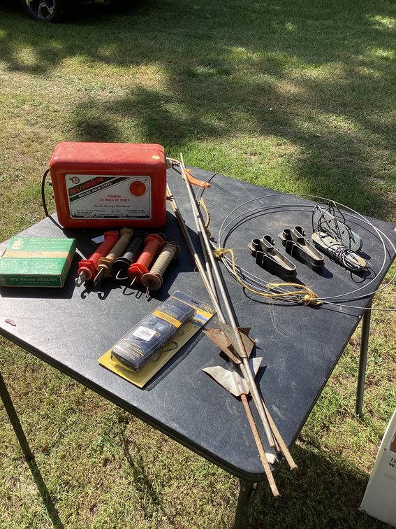 Blitzer elec. fence charger with posts and misc.