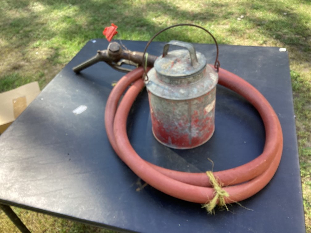 Old hose and gas can