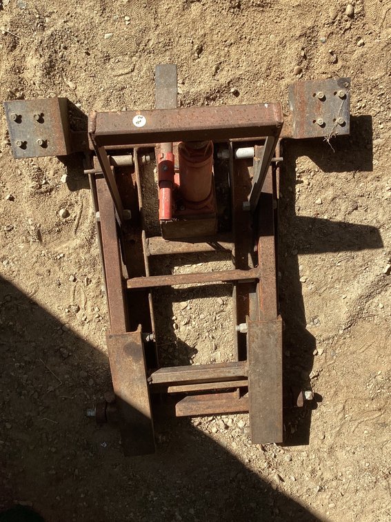 Small hydraulic lift.  Works