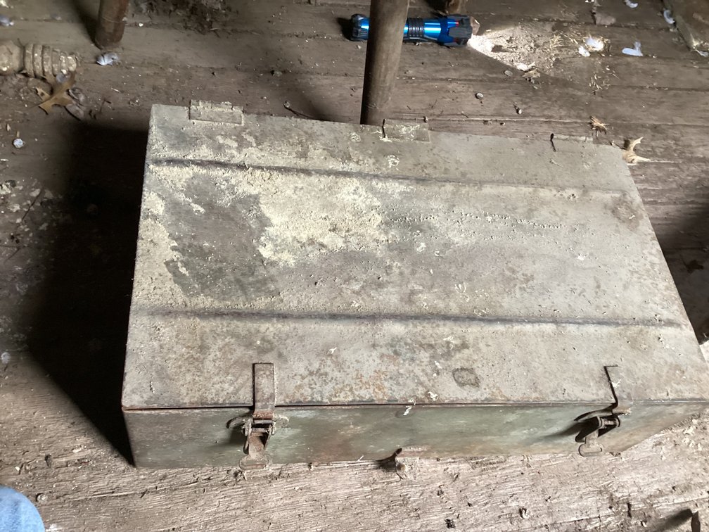 Metal container full of brass and metal scrap.