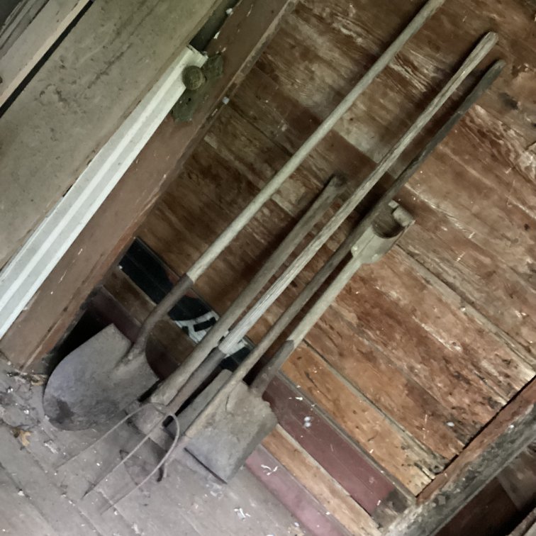 Pick axe, hoe, fork and 2 shovels
