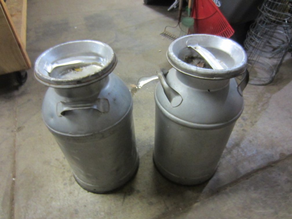 2 STEEL MILK CANS