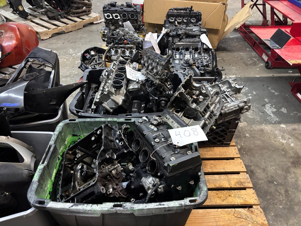 2 PALLETS OF MOTORCYCLE ENGINES AND ENGINE PARTS