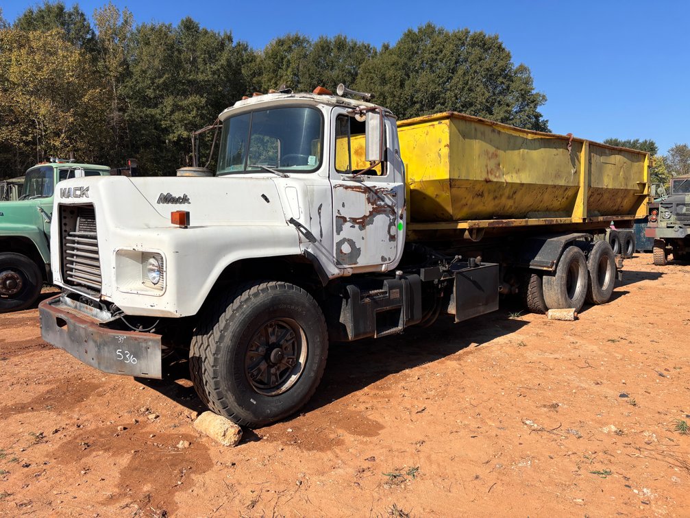 1988 Mack DM690S Roll-Off Truck w/Dumpster