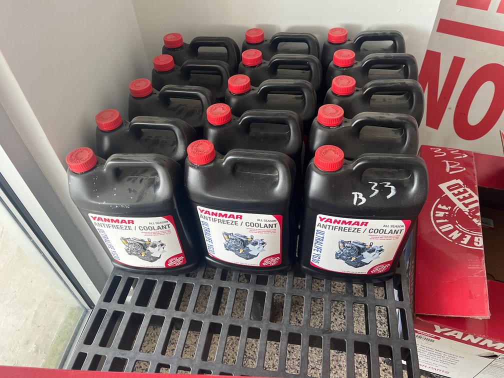 LOT OF YANMAR ANTIFREEZE,  DIESEL ENGINE OIL, AND YANMAR MAINTENANCE KIT
