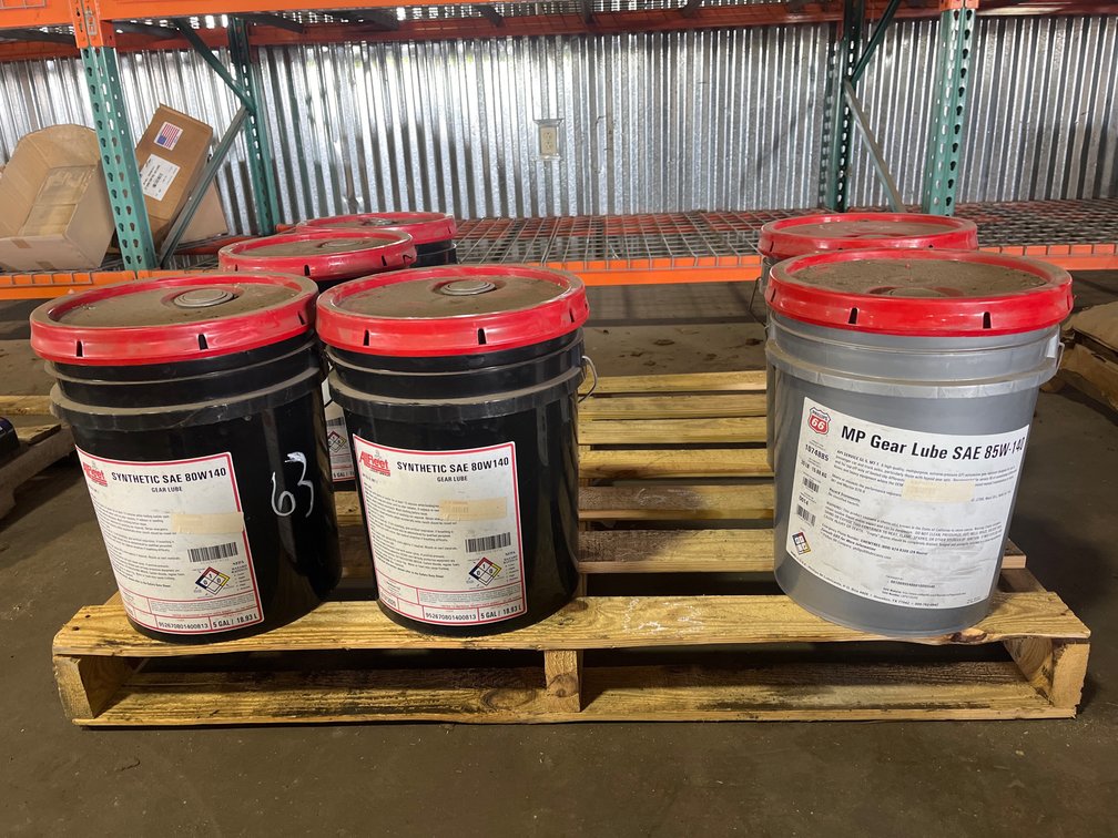 6 BUCKETS OF GEAR LUBE 
