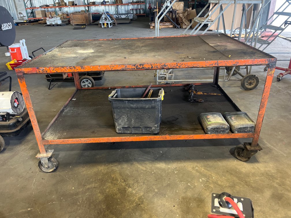 METAL WORK TABLE ON CASTERS