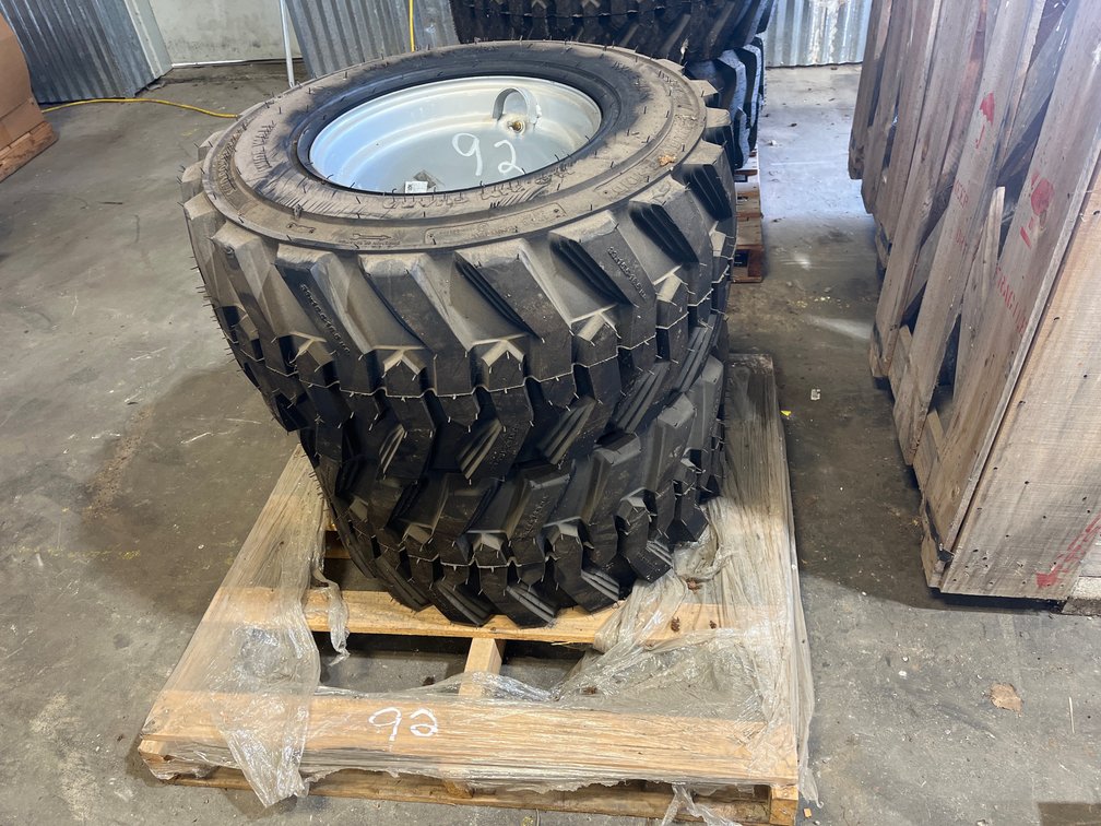 LOT OF 2 YANMAR RIMS AND TIRES
