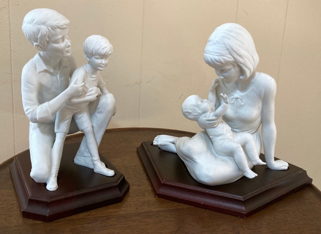 Vintage Kaiser Germany Bisque Porcelain Mother w/Child & Father w/Child on Wood Base 8” - leg has repair 