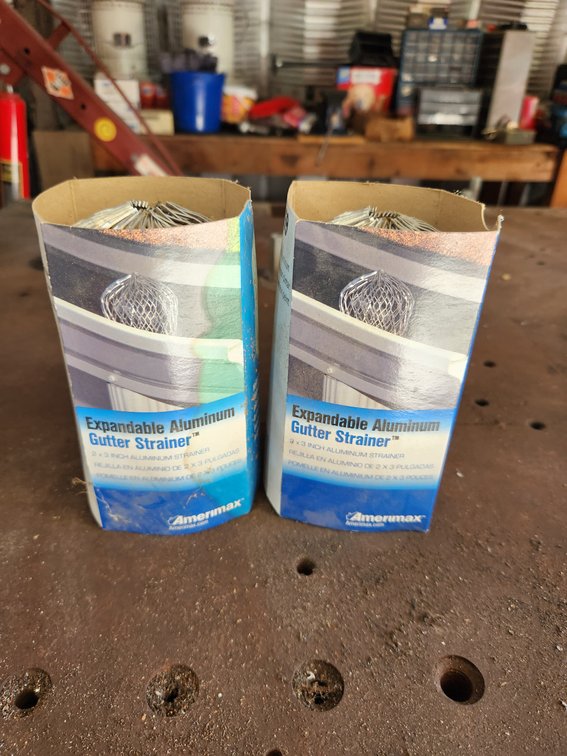 Two Expandable Aluminum Gutter Strainers.