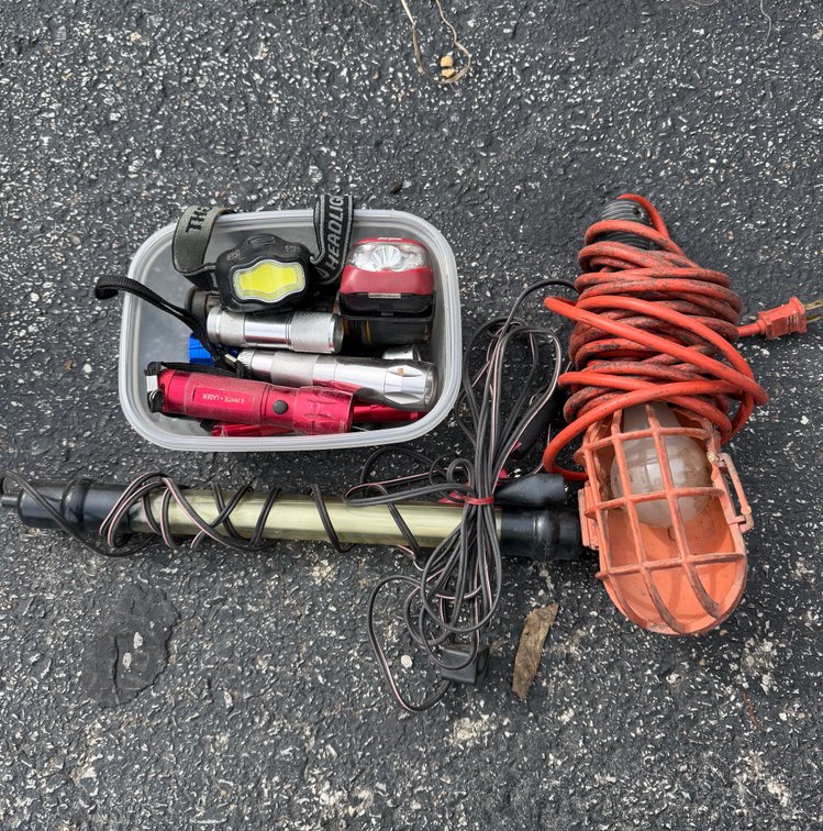 Lot of headlights, flashlights, and hanging lights