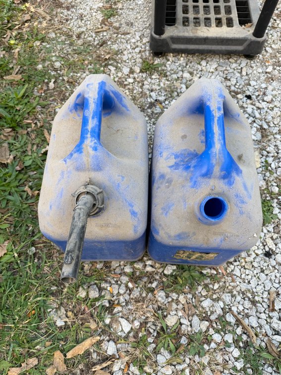 2 Blue 5 gal gasoline containers